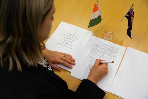 Chief Defence Scientist, Professor Tanya Monro, signing the Australia - India Science and Technology Implementing Arrangement at Russell Offices, Canberra.
Defence