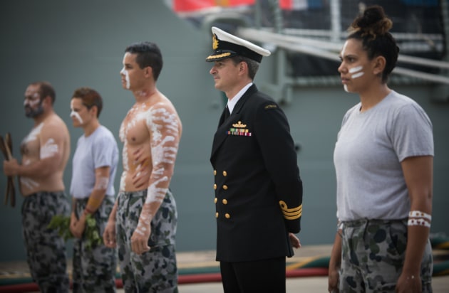 RAN&rsquo;s Bungaree troupe of Indigenous dancers and Captain John Stavridis.
Defence