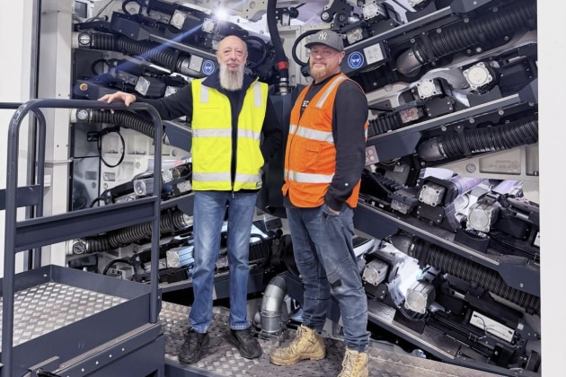 The new W&H NovoFlex has pride of place at J&P Flexographics: Owner Phil Jones (left) with Craig McCulloch, prepress & operations manager.