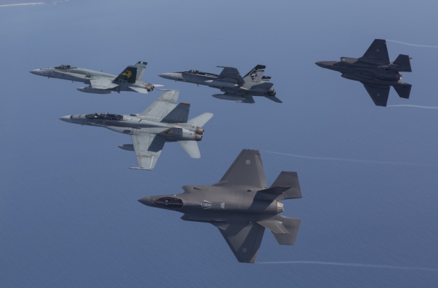F-35A Joint Strike Fighters fly in formation with an F/A18 Hornets.
Defence