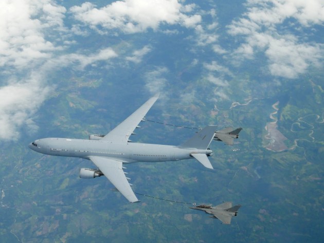 French Air Force (Armee De l'Air) Dassault Rafales fly in formation with a No. 33 Squadron KC-30A Multi Role Tanker Transport aircraft en route to Australia to participate in Exercise Pitch Black 2018. Defence