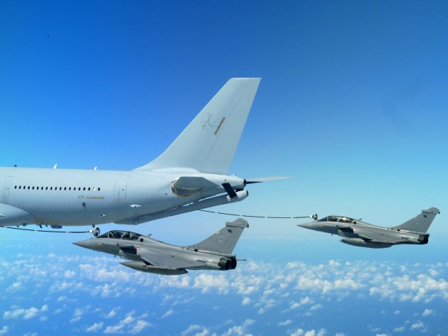 French Air Force (Armee De l'Air) Dassault Rafales fly in formation with a No. 33 Squadron KC-30A Multi Role Tanker Transport aircraft en route to Australia to participate in Exercise Pitch Black 2018. Defence