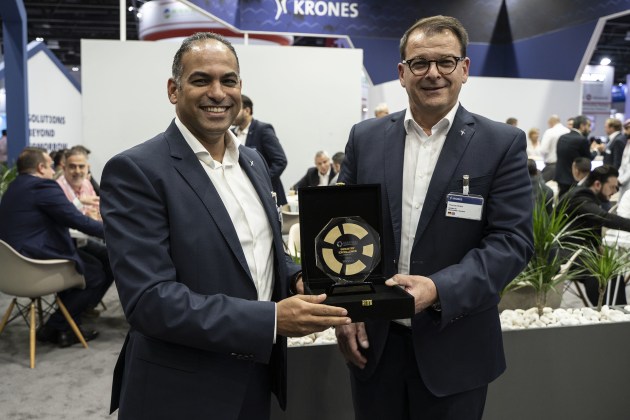 Thomas Ricker and Amir Ahmed, chief sales officers for Krones Middle East Northern Africa, seen accepting the 2022 Industry Excellence Award in the sustainability category at the Gulfood Manufacturing Awards.