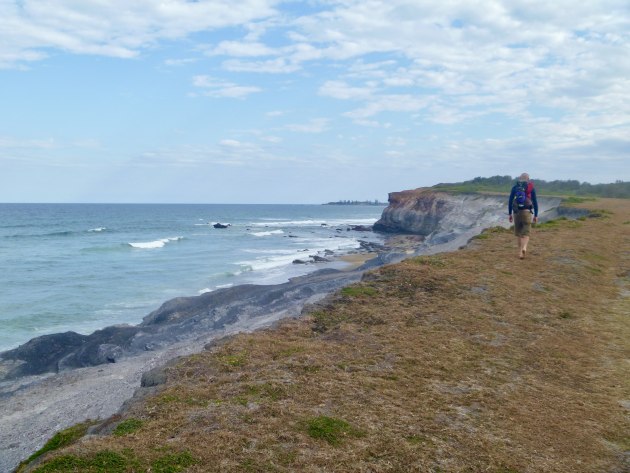 Grey cliffs, Lake Arragan on the Yuraygir Coastal Walk. Connect Adventures