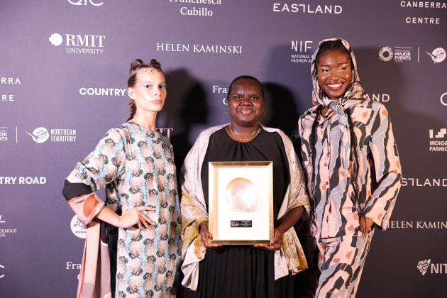 Leila Gurruwiwi accepts award for Ngali, Business Achievement Award, Supported by QIC, National Indigenous Fashion Awards, 2024, Photo by Marley Morgan_10
