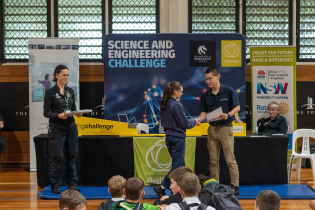 Lockheed Martin Australia&rsquo;s Air 6500 Australian Industry Capability Manager, Sam Wong presents student awards during the Science and Engineering Challenge 2022. (Supplied)