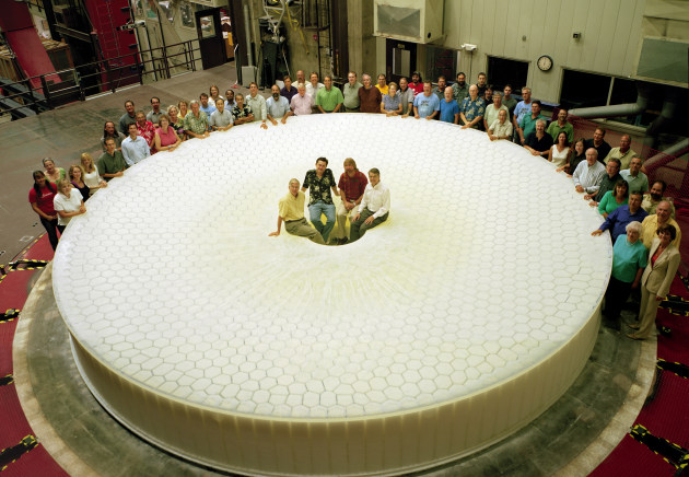 Members of the team building the LSST, a large survey telescope being built in Northern Chile, gather to celebrate the successful casting of the telescope's 27.5-foot-diameter mirror blank in August 2008. Image: Howard Lester / LSST