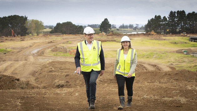 Auckland Airport GM of property and commercial Mark Thomson, and head of retail Lucy Thomas survey earthworks now underway for the new fashion outlet centre at Auckland Airport.