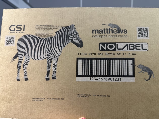 The system applies a white underlay beneath the black barcode.