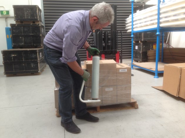 Dr Ross Headifen with some of the packing tape BioGone offers.