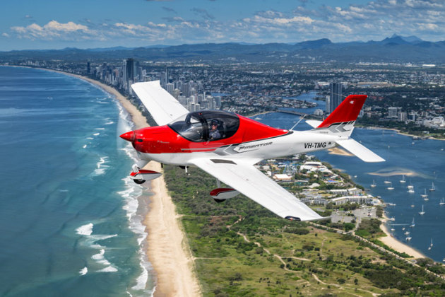 Crossing the coast: the P-Mentor cuts a fine figure in the air. (John Absolon)