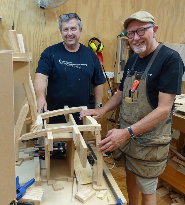 Michael Fortune (right) shown here discussing West Australian Peter Bell's chair design which required some complex jigmaking.