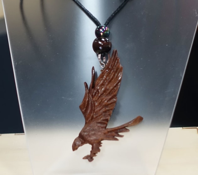 Michael Quinn, Native Eagle, rosewood (Tiny Treasures). "Travelling 1000km a week through the Australia bush for work I have seen so many amazing things. From wedge eagles feasting on road kill to peacock standing at the side of the road with all there feathers out and proud it&rsquo;s not hard to get inspiration and then there&rsquo;s the timber. I drive through farming land were there are trees poisoned for ready for racking and burning; mostly for cattle farming, some for cotton. My wife has often told me that I can&rsquo;t save every tree and re-purpose it all. With the time that I spend away from home I try to put it to good use so I always carry my knives and files with me. Mostly working with hand tools and what I see for inspiration that day, nights are spent carving."