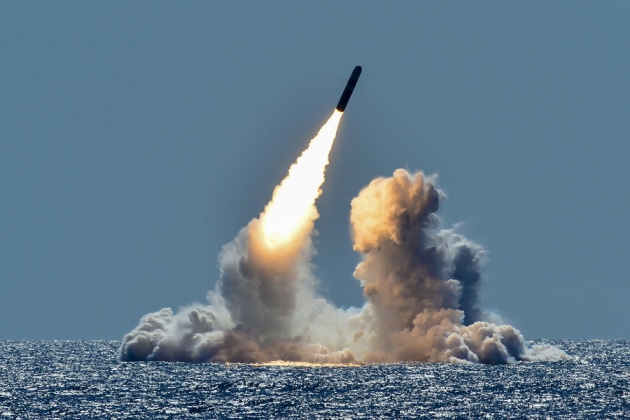 An unarmed Trident II D5 missile launches from the ballistic missile submarine USS Nebraska in the Pacific Ocean. US DOD