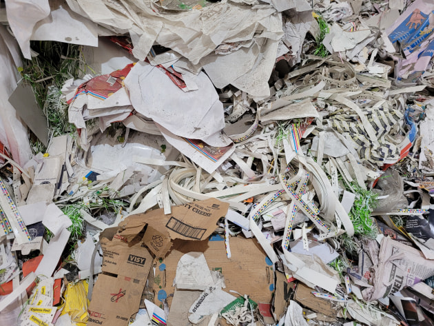 Paper and cardboard for sorting.
