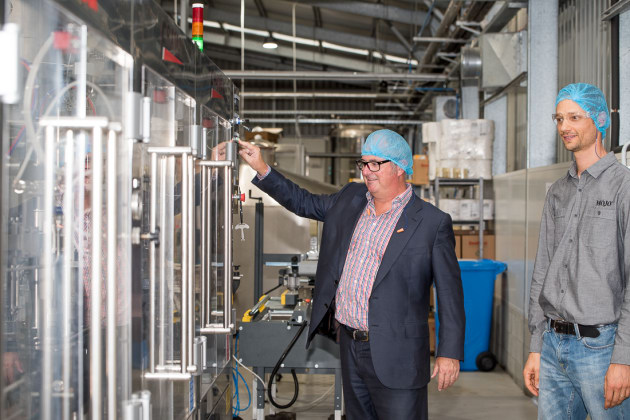 CEO and co-founder Anthony Crabb gives guests a tour of the new bottling line in Willunga, South Australia.
