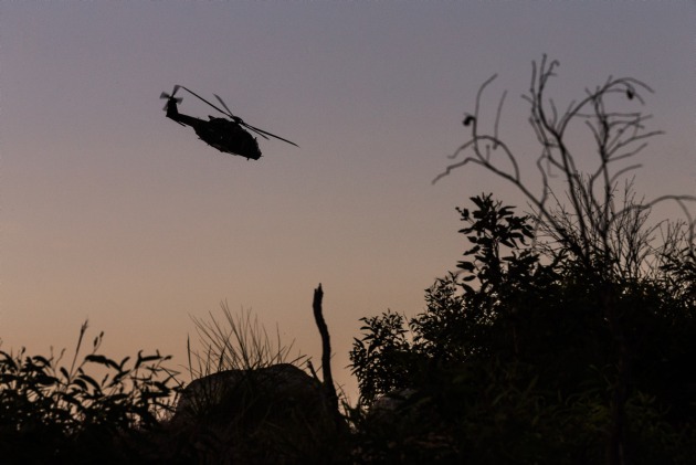 An Army MRH90 flying near Mt Stuart, Townsville.
SGT Janine Fabre/Defence