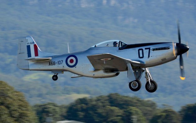 The CAC Mustang departs to catch up with the fighter formation. (Steve Hitchen)