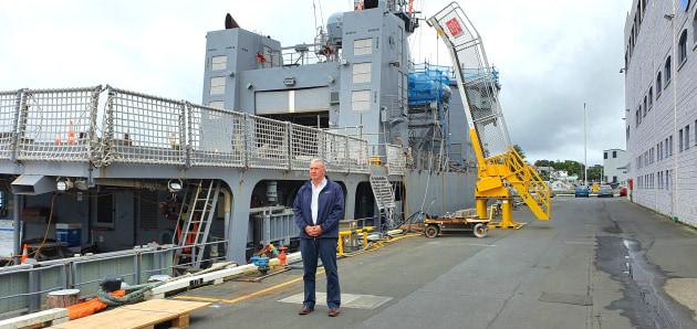 Mark Worsfold with HMNZS Otago. (Supplied)