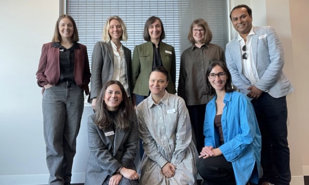 Photo of the Refashioning team; left to right: Rebecca van Amber, Courtney Holm, Alice Payne, Jenny Underwood, Saniyat Islam, Yassie Samie, Julie Boulton and Sunny Bhatt.