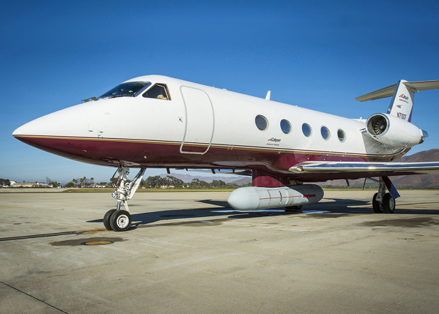 A Gulfstream business jet is fitted prototype of Raytheon&rsquo;s Next Generation Jammer mounted beneath it. Credit: Jim Haseltine/High-G Productions