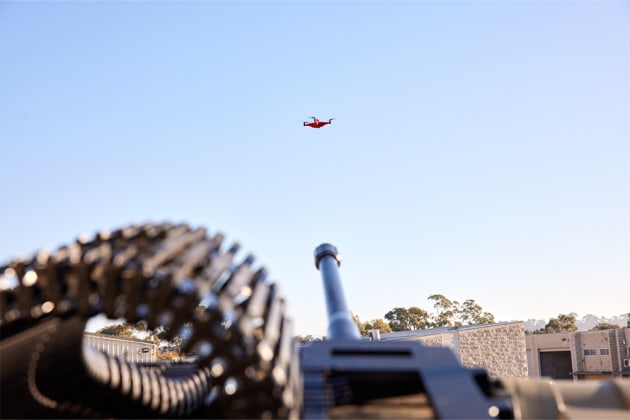 Slinger with a drone in its sights at the launch event. 

Credit: EOS