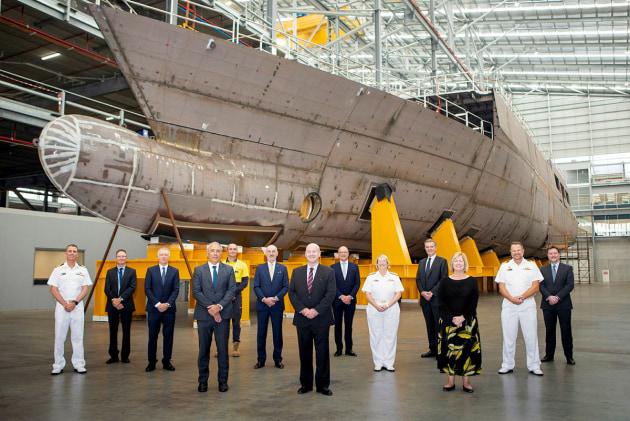 Attendees at the official opening of the OPV Enterprise Office in front of &lsquo;Pilbara&rsquo;, which is currently under construction at the Henderson Shipyard in Western Australia. (Supplied)