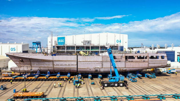 The two halves of the first OPV are brought together and welded to form a complete hull. 
Defence