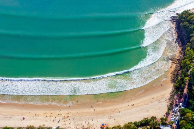&copy; Paul Smith. Unfinished symphony. Taken at Noosa Heads, Queensland from a helicopter. The perfect lines remind me of the lines on sheet music, with the surfers being the notes.