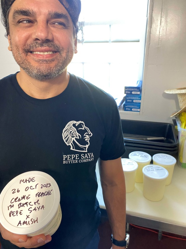 Pepe Saya co-founder Pierre Issa with the first batch of cr&egrave;me fraiche made with the Amish.