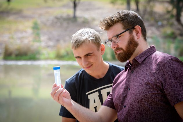 Lundquist and Dr Chalker examining a field sample. Credit: Flinders Uni