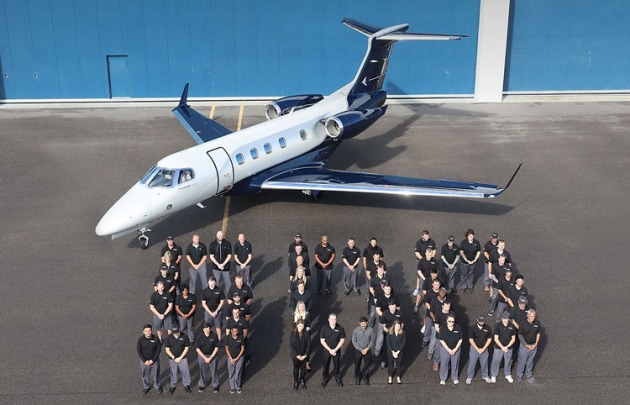 The 500th Phenom 300 with Embraer staff. (Embraer Executive Jets)