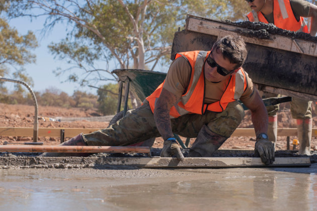 Sapper Collin Bowley of 6th Engineer Support Regiment, constructing an all-weather creek crossings on the outskirts of Jigalong Community.
Defence