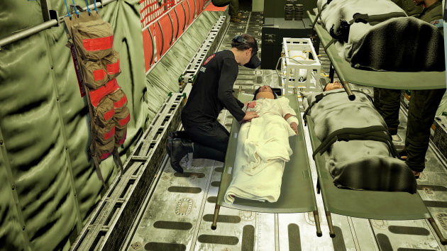 View from inside a RAAF C130J while a medic immersed in MR is caring for a physical casualty. 

Credit: Real Response