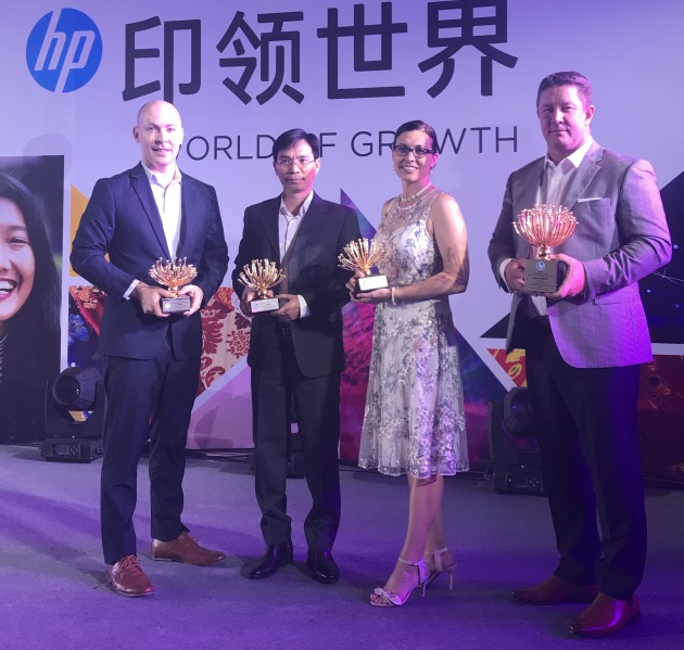 Grand winners: (l-r) Lindsay Nutley and Khoa Dang, QLM;  with clients Racquel and Steve Goodchild from Pukara Estate.