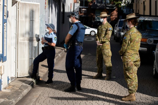 Australian Army soldiers support New South Wales Police with quarantine compliance checks in Sydney.
Defence