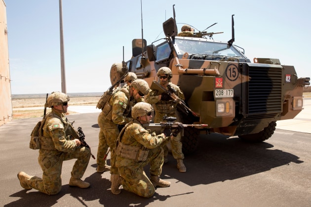 A Combat Team moves forward to secure an area of interest at RAAF Learmonth.
Defence