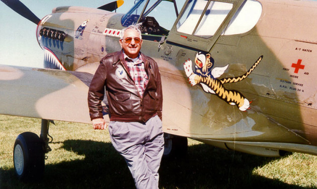 Rudy Frasca with his P-40 Warhawk, one of several warbirds he owned over the years. (Frasca International)