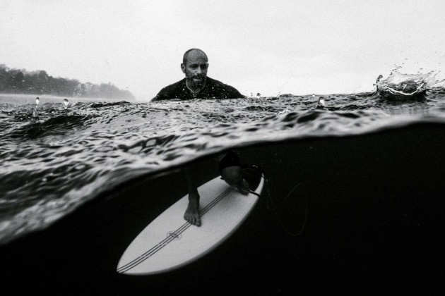 &copy; Russell Ord. Tom Carroll portrait in the tropical rain Indonesia.