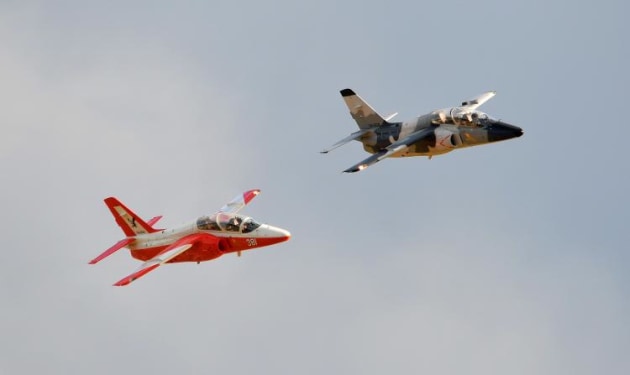 Two SIAI Marchetti S.211s roll out along the air show centre line. (Steve Hitchen)
