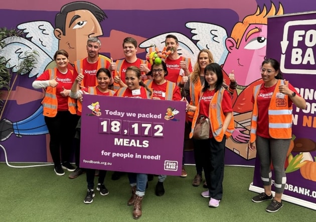 Saputo Dairy Australia employees at Foodbank Victoria in Yarraville.
Source: SDA
