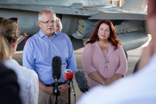 Scott Morrison and the Minister for Defence Industry Melissa Price speak to the media during a visit to RAAF Base Tindal in February.
Defence