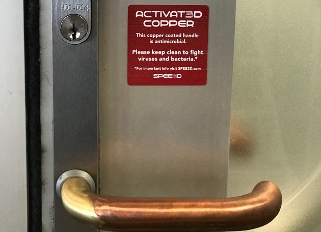 The SPEE3D team then developed a process to coat stainless-steel door touch plates and handles in under 5 minutes. (supplied)
