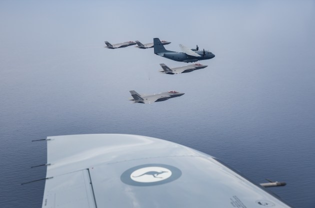F-35 Lightning II jets fly off the coast
of Newcastle with a C27-J Spartan. (Supplied)