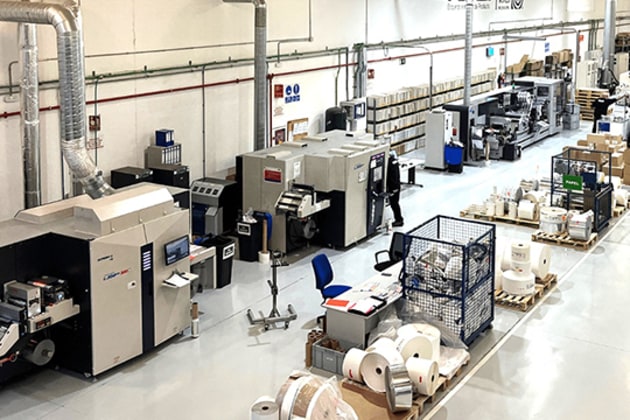 A row of Screen Label 350UV-SAI presses at Rever, Spain. Rever and parent Docuworld Group operate five L350s.