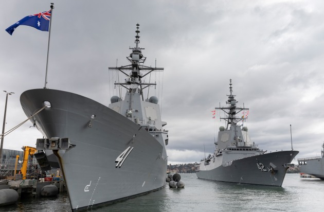 Royal Australian Navy guided missile destroyer HMAS Sydney passes sister ship HMAS Brisbane.
Credit: Defence