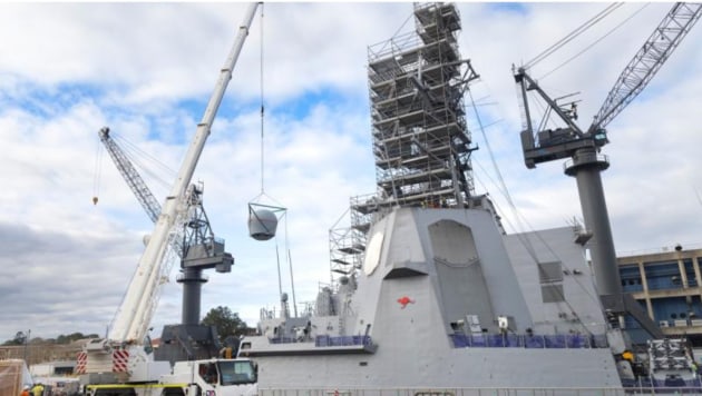 The Maritime Advanced SATCOM Terrestrial Infrastructure System (MASTIS) is removed from HMAS Sydney at Garden Island, NSW.  

Credit: Leading Seaman Abdus Chowdhury / Defence