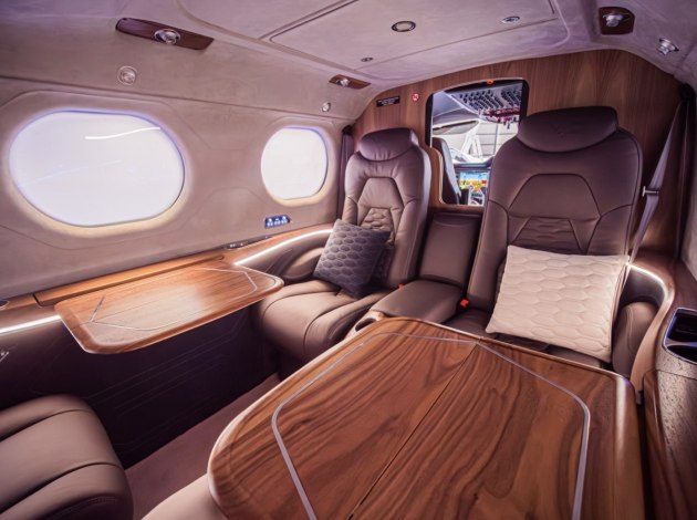 The centrepiece is what Tecnam calls the "largest club of its class": a 6-foot backrest-to-backrest club seating arrangement plus two forward-facing seats and an optional extra seat. (Tecnam)