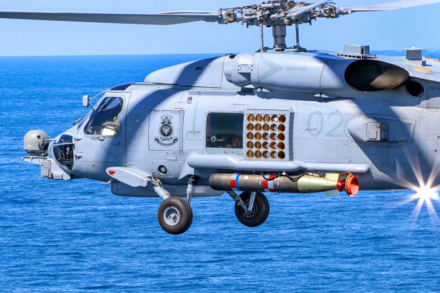 A RAN MH-60R Seahawk helicopter from 816 Squadron, Nowra, during a recoverable torpedo exercise.
Defence