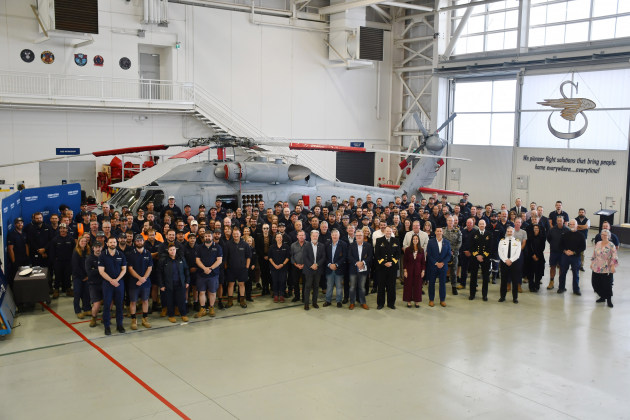 (L-R) Vice Admiral Tim Barrett AO, CSC, RAN (Retd); Chairmen Keith Payne VC Veterans Benefit Group, Fred Campbell and Rick Meehan; Commodore Anthony Savage, Director General Navy Aviation, Defence; Toni Marzulli, VP Operations Lockheed Martin Australia and New Zealand, and Cliff Kyle, GM Sikorsky Australia, pictured with the Sikorsky Australia workforce celebrating 10 years of its purpose-built Nowra sustainment facility. (Sikorsky Australia)